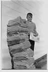 Boy delivering the Daily Reflector